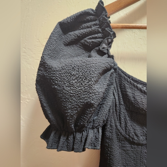 Pretty Little Thing Black Textured Puff Sleeve Frill Skirt Bodycon Dress - Picture 8 of 9